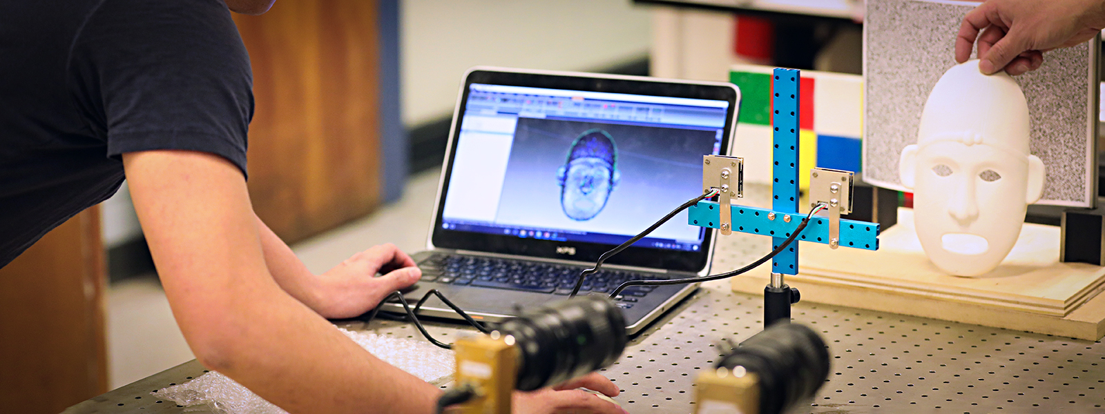 graduate students work on facial recognition